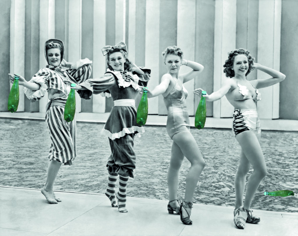 New York, New York: July 4, 1939.Four of Billy Rose´s Aquabelles stage a fashion show of the past, present and future bathing suit styles at the New York World´s Fair.